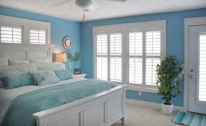 Plantation shutters in a bedroom